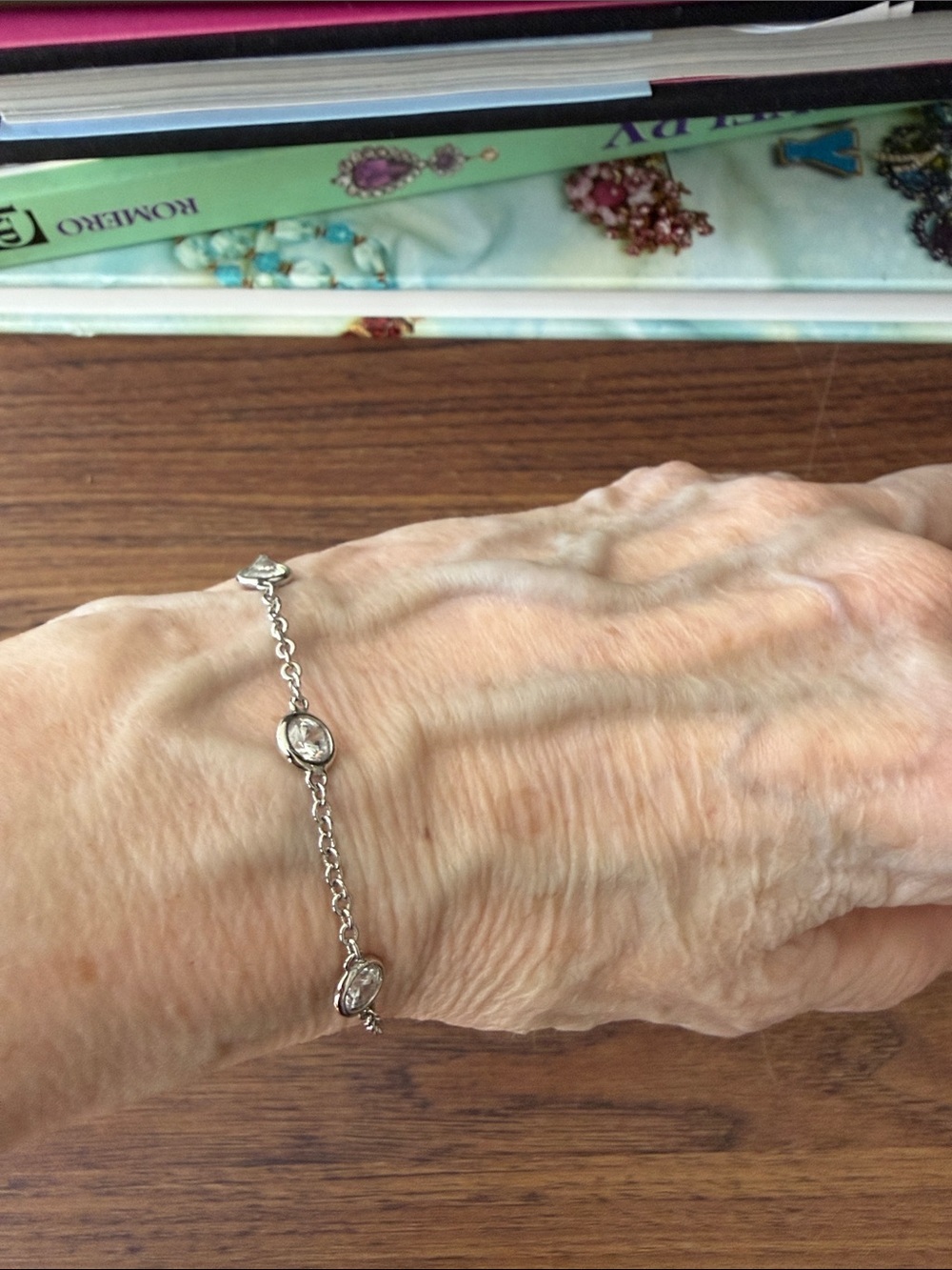 Authentic Givenchy Silver Plated Clear Bezel Set Crystal Station Bracelet.